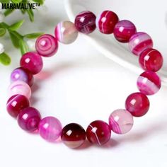 Product Information: Material: agate Style: Fashionable Shape: Round beads Processing process: manual Size :6cm,8cm,10cm,12cm Packing list: String X1PCS Bohemian Pink Agate Bracelets, Pink Agate Bracelets With 8mm Beads, Pink Agate Round Bead Crystal Bracelet, Pink Agate Beaded Bracelets, Pink Agate Beaded Bracelets With Natural Stones, Pink Agate Hand-strung Bracelets, Handmade Pink Agate Bracelets, Carnelian Agate, Natural Gold