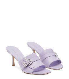 Maverick 75 Slide | Stuart Weitzman Luxury Mules With Buckle Closure For Spring, Luxury Spring Mules With Buckle Closure, Designer Mules With Buckle Closure For Spring, Spring Square Toe Mules With Buckle Closure, Formal Fitted Mules With Square Toe, Formal Fitted Square Toe Mules, Leather Fitted Mules With Heel Loop, Luxury Fitted Mules For Spring, Designer Heels With Heel Strap And Square Toe