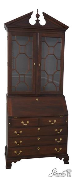 an old wooden dresser with glass doors and drawers on it's top, sitting in front of a white background