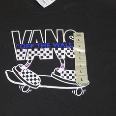 Vans "Off The Wall" Board Style T Shirt. Black And White Checkerboard Graphic With Blue Trim On The Front. Size L, Brand New With Tags. Vans Black Tops With Graphic Print, Vans Black Graphic Tee, Vans Black Top With Graphic Print, Black Vans Tops With Graphic Print, Vans Black Crew Neck T-shirt, Black Vans Crew Neck T-shirt, Black Crew Neck T-shirt By Vans, Black Short Sleeve Vans Tops, Black Vans Crew Neck Top