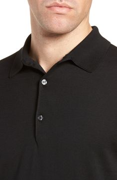 This unbelievably soft polo is spun from breathable sea island cotton and crafted with an eye for timeless British style. 27" length (size Medium) Three-button placket Spread collar Short sleeves Ribbed cuffs and hem 100% cotton Machine wash, line dry Made in the UK Men's Designer Classic Solid Color Polo Shirt With Button Closure, Classic Polo Shirt With Button Closure And Spread Collar, Classic Black Polo Shirt With Button Closure, Classic Button-up Polo Shirt For Business Casual, Classic Black Polo Shirt With Buttons, Classic Black Polo Shirt For Golf, Formal Black Cotton Polo Shirt, Classic Black Polo Sweater With Button Closure, Classic Polo Sweater For Business Casual