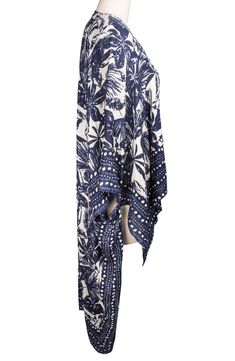 Whether you're going for a stroll under the sun or out for an evening, this ultra lightweight duster will radiate opulence. 26" L x 51" W Open front 3/4 length sleeves
 Side vents All-over print Woven 100% rayon Hand wash cold, line dry Imported Model stats: 5'10", 32" bust, 25" waist, 36" hip. Long Sleeve Summer Kimono For Daywear, Summer Long Sleeve Kimono For Daywear, Chic Printed Outerwear For Summer, Chic Printed Summer Outerwear, Chic Summer Printed Outerwear, Chic Summer Outerwear With Kimono Sleeves, Spring Beach Kimono With 3/4 Sleeve, Summer Beach Kimono With 3/4 Sleeves, Bohemian Summer Outerwear With 3/4 Sleeves