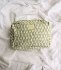 As a makeup enthusiast with a passion for all things beauty, I created these bags to combine functionality and style. Fully Lined and machine washable for ultimate convenience. Measurements: width: 10 inches, height: 7 inches, depth: 4 inches Green Rectangular Cosmetic Bag For On-the-go, Green Rectangular Pouch For On-the-go, Practical Rectangular Cosmetic Bag With Removable Pouch, Versatile Green Travel Pouch, Practical Rectangular Cosmetic Bag For Storage, Practical Rectangular Cosmetic Storage Bag, Practical Green Pouch Bag, Modern Zipper Cosmetic And Toiletry Pouch, Practical Rectangular Bag With Zipper Pouch