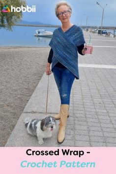 a woman walking her dog on a leash with the caption crossed wrap - crochet pattern