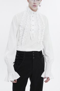 This shirt is an irregular stand collar. Puff sleeves and flared cuffs are elastic. Layered ruffled on the front. Detailed buttons on the neckline for closure. Color:  White Materials:  Polyester 100% Notice:  Other Accessories Are Not Include Style Types:  Gothic Version:  Loose Soft Index:  Fit Elastic Index:  Inelastic Thickness Index:  Thin Size Length (in) Bust (in) Waist (in) Shoulder (in) Sleeve (in) Neckline (in) S 28.9 41.3 40.9 17.9 30.7 16.1 M 29.3 43.3 42.9 18.5 30.9 16.5 L 29.7 45.3 44.9 18.9 31.1 16.9 XL 30.1 47.2 46.9 19.5 31.3 17.3 2XL 30.5 49.2 48.8 19.9 31.5 17.5 3XL 30.9 51.2 50.8 20.5 31.7 17.9 4XL 31.3 53.1 52.8 20.9 31.9 18.3 Size Length (cm) Bust (cm) Waist (cm) Shoulder (cm) Sleeve (cm) Neckline (cm) S 73.5 105 104 45.5 78 41 M 74.5 110 109 47 78.5 42 L 75.5 115 114 Style Types, Gothic Shirts, 16 9, Puff Sleeves, Stand Collar, Puff Sleeve, Color White, Collar, White