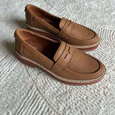 Never Worn. Brand New Brown Moccasins For Office Wear In Spring, Chic Brown Leather Moccasins, Brown Everyday Loafers With Round Toe, Brown Round Toe Loafers For Everyday, Brown Office Moccasins For Spring, Leather Moccasins For Everyday, Everyday Leather Moccasins, Leather Moccasins For Everyday Wear, Casual Moccasins With Leather Footbed For Office