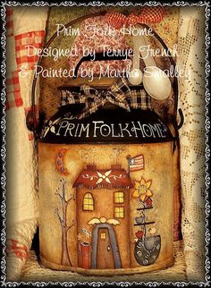 an old fashioned purse is sitting on top of a quilted pillow with the words primitive home designed by rennie thomas painted by manic smith society