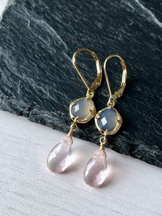 Rose Quartz and Gray Moonstone Earrings, Blush Pink Dangle Gold Earrings, Delicate Two Stone Drops Earrings, Elegant Gift for Girlfriend These blush elongated drop earrings feature gray moonstone hexagonal stones framed in 14k gold filled and suspended from them are micro faceted pastel pink rose quartz teardrops, wire wrapped in 14k Gold Filled. The Earrings are suspended from gold filled lever back ear wires. These are ideal for a night out, they are a great choice for causal wear and they wil Elegant Nickel-free Rose Quartz Earrings, Pink Gemstone Teardrop Earrings, Nickel-free Rose Quartz Dangle Earrings, Elegant Rose Quartz Gemstone Earrings, Elegant Rose Quartz Drop Earrings, Rose Gold Dangle Earrings With Rose Quartz, Rose Quartz Gemstone Dangle Earrings, Nickel Free Rose Quartz Jewelry, Rose Quartz Teardrop Earrings For Gift