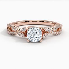 a rose gold engagement ring with an oval cut diamond in the center