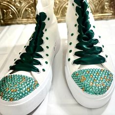 Pick your own colors and Personalized Dancers Sneakers for your Quinceañera. Remember to add your name and the date of the event on the Personalization tab. Perfect match for that dress, don’t forget to ask us for a matching Tiara - Crown. You can search in our Etsy store - GuiltychicPrint for more information about our reviews.🌟Includes🌟- Pick shoelace colors.- The toe top is covered with bright rhinestones.- On the sides of the shoe (right & left), the idea/name/date is printed in solid or g Customizable Green Sneakers With Round Toe, Custom Green Lace-up Sneakers, Custom Green High-top Sneakers, Quinceanera Green, Quince Party, Quinceanera Shoes, Personalized Sneakers, Blue Crown, That Dress