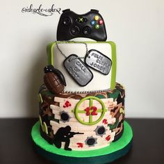 a birthday cake made to look like a video game controller and other things on it