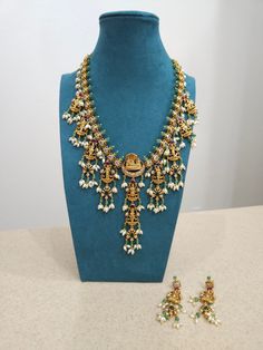 Add charm and charisma to your beautiful personality with these beautifully designed and handcrafted Brass necklaces. The antique finish gives this Necklace a very eye-catching look. Long necklace designed beautifully and compliments very well. Wear it with any of your party or casual outfits and grab compliments all the way! Goldplated Meenakari Chandbali Metal Necklaces, Antique Gold Kundan Jewelry For Celebration, Bollywood Style Long Temple Necklace For Celebrations, Antique Gold Brass Jewelry For Celebration, Heavy Temple Style Long Necklace, Dual-tone Chandbali Necklaces For Rituals, Kundan Long Necklace Temple Jewelry, Dual-tone Kundan Necklaces For Rituals, Antique Gold Kundan Jewelry Gift