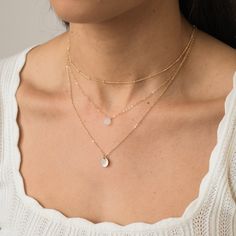 Our Dainty Satellite Chain Necklace is an absolute must-have for your jewelry collection. It’s dainty and understated, and it just adds the perfect feminine touch. If you’re looking for a necklace to wear every day - this is it! It looks amazing on its own and even better paired with other layering necklaces. Made of 14k gold filled or sterling silver so you can wear it 24/7 - to the gym, shower, and to sleep. Perfect for lounging around the house or wearing to Sunday brunch. DETAILS 14k gold fi Minimalist Layering Pearl Chain Necklace, Minimalist Pearl Chain Necklace For Layering, Minimalist Layered Necklace With Adjustable Chain, White Minimalist Layered Necklace With Adjustable Chain, Delicate Pearl Chain Necklace For Layering, Minimalist White Necklace For Layering, White Minimalist Necklace For Layering, Delicate Double Chain Necklaces, Simple Delicate Chain Necklace For Layering