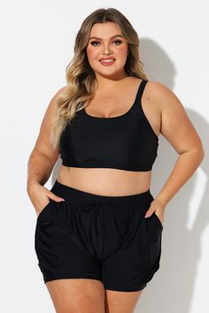 Plus Size Black Round Neck Bikini Top Black Swimwear With Built-in Bra, Black Swimwear With Built-in Bra For Beachwear, Black Beachwear Tankini For Swimming, Sporty Black Tankini For The Beach, Black Stretch Tankini Bra Friendly, Black Tankini With Built-in Bra For Vacation, Black Sports Swimwear With Built-in Bra, Black Sports Tankini For Beachwear, Black Beachwear Swimwear With Built-in Bra