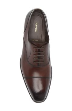 Styled with a cap toe and signature Blake welting, this burnished-leather oxford adds sophisticated flair to your formal looks. Lace-up style Leather upper, lining and sole Made in Italy Designer Shoes Elegant Goodyear Welted Bridle Leather Oxfords, Formal Oxfords With Goodyear Welting And Snip Toe, Classic Snip Toe Oxfords For Office, Timeless Formal Oxford Shoes With Brogue Detailing, Timeless Formal Oxford With Brogue Detailing, Timeless Cap Toe Oxfords For Business Casual, Timeless Brown Oxfords For Formal Occasions, Designer Brogue Detailed Oxfords For Formal Wear, Designer Brogue Oxfords For Formal Occasions