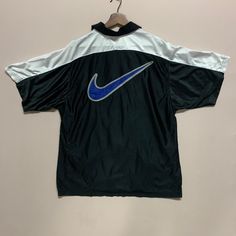 [DESCRIPTION] Please read the description first before buy my items‼️‼️ Vintage 90s Nike Spell Out Big Logo Zipper Ups Jersey Tee Size on tag : M Tag says M,fits like L All in good condition [MATERIAL] Polyester  [MEASUREMENT] Measurement:  armpit to armpit : 23.5 inches  Back collar to bottom : 27.5 inches [CONDITION] - All in good condition  - No hole no rip no stain [PAYMENT & NOTICE] - We accept PayPal ONLY - No return/refund - All items will be post over shipping company counter within 1-3 working days after payment completed and please allow 1-3 weeks for shipping delivery to your destination. -We are trusted seller. Do message me if you have any questions to ask about this item. ❌ATTENTION❌ 💥Do not rely on tag size as pre-worn item may have been altered,stretched or shrunk & vintag Pull Nike 90s, Nike Athletic Vintage Sweatshirt, Affordable Playful Nike T-shirt, Cheap 90s Style Sports T-shirt, Nike Vintage T Shirt, 90s Apparel, Nike 90s Vintage, Nike Company, Vintage Nike Tee