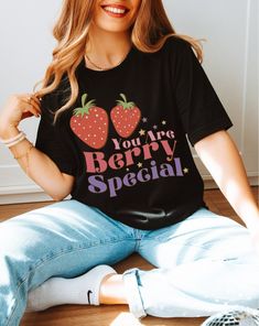 We think you are berry special and deserve this super cute summer tee! This t-shirt is perfect for everyday summer wear, or makes for a berry sweet gift to someone you love!  Are you looking for your new favorite t-shirt? This classic unisex jersey short sleeve tee is definitely a favorite in our book. Our graphic tees are custom created specifically for you. Select your shirt style, color, size and print design. ❃ ❃ ❃ PRODUCT SIZING AND FABRIC CONTENT One listing, multiple color options. ❃ Size Fun Strawberry Print Crew Neck T-shirt, Sweet Strawberry Print Short Sleeve T-shirt, Cute Spring T-shirt With Funny Text, Cute Black T-shirt For Summer, Fun Strawberry Print Short Sleeve T-shirt, Cute Short Sleeve T-shirt With Strawberry Print, Fun Short Sleeve T-shirt With Strawberry Print, Cute Strawberry Print Short Sleeve T-shirt, Cute Relaxed Fit T-shirt With Strawberry Print