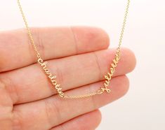 This is a tiny names necklace with 1, 2, 3, 4 pendants and chain spaces between names. I make this mom necklace in 18K yellow gold, 18K rose gold, 18K white gold, with a cable chain. Different chain lengths are available. I could add a diamond or a birthstone to the necklace - contact me. (Diamond - $45 ea, colored birthstone $15) Each name is 0.6-1 inch wide and about 0.14 in tall, with 1.6mm thickness (15-20mm wide and 4mm tall). The size estimate is for names with 4-8 characters. This is a cu Personalized Delicate Yellow Gold Name Necklace, Delicate Personalized Yellow Gold Name Necklace, Custom Name Yellow Gold Jewelry Gift For Mom, Delicate Engraved Gold Name Necklace, Elegant Yellow Gold Jewelry With Names, Custom Name Necklace In Yellow Gold For Mom, Yellow Gold Nameplate Necklace With Names, Custom Name Yellow Gold Necklace For Mom, Custom Name Yellow Gold Necklace Gift For Mom