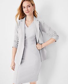 Elevate your wardrobe with the Ann Taylor Double V Seamed Sheath Dress, a testament to sophisticated styling and comfort. This dress features a unique double V-neck at the front and back, enhancing its elegant silhouette. 

- Size: 18 Regular
- Color: Pebble Grey Melange
- Gender: Female
- Material: 66% Polyester, 28% Rayon, 6% Spandex; Lining: 100% Polyester
- Length: 25" from natural waist
- Fit: Tailored fit
- Care: Machine washable

Crafted in a bi-stretch fabric that maintains its shape whi Ann Taylor Work Outfits, Professional Dresses Women, Flight Attendant Interview Outfit, Women’s Interview Outfit, Courtroom Attire Women, Dress Suit Women, Sheath Dress Outfit, Professional Fits, Peplum Suit