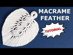 the macrame feather is being used to make an ornament