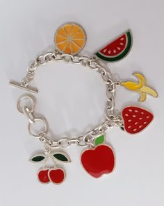 Handmade Bracelet Fruit Mix Charm Bracelet Womens Girls Boho Rainbow Colorful Enamel Charm Silver Tone Arty Modern Design Huge Toggle CLASP Everyone LOVES these handmade bracelets... FABULOUS Colorful fun happy festive pop art easy to wear and very durable. Fun JUMBO FRUIT charm, bracelet is 7 1/2 to 9 inches long total and has a jumbo sized toggle clasp THAT MAKES IT EASY FOR YOU TO GET OFF AND ON YOURSELF Great for Women and Girls. Bracelet is stainless steel hypoallegenic all safe metals. Exc Novelty Multicolor Charm Bracelet, Nickel-free Multicolor Novelty Jewelry, Nickel Free Multicolor Metal Bracelets, Trendy Multicolor Nickel Free Charm Bracelet, Multicolor Nickel Free Metal Bracelets, Trendy Multicolor Nickel-free Charm Bracelet, Playful Handmade Silver Charm Bracelet, Trendy Multicolor Charm Bracelet, Cute Multicolor Nickel-free Bracelets