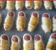 pigs in a blanket pretzels are ready to be eaten for the baby's first world site