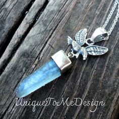 "Natural Aqua Aura Quartz Point Sterling Silver Eagle Pendant on a Sterling silver Rolo chain ❤︎Featured in this listing is a sterling silver, handmade, natural stone pendant.  This lovely handmade pendant features a beautiful, Large Aqua Aura Quartz Point stone that has been set into polished Sterling Silver.  Just above is a detailed Eagle with a large bail above!   ❤︎Made with all Sterling Silver and comes featured on a Sterling Silver chain (you pick length) Gemstone(s): Natural Aqua Aura Qu Celestial Silver Labradorite Jewelry, Mystical Gemstone Jewelry For Healing, Spiritual Labradorite Birthstone Jewelry, Spiritual Silver Crystal Necklaces With Birthstone, Mystical Gemstone Pendant Jewelry, Mystical Sterling Silver Crystal Necklaces With Natural Stones, Mystical Sterling Silver Necklace With Natural Stones, Mystical Silver Pendant Jewelry, Mystical Gemstone Jewelry For Gifts