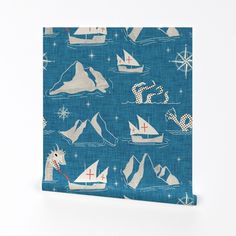 a blue canvas with sailboats and sea animals on it's side, against a white background