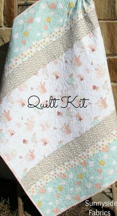 the quilt kit is hanging up outside