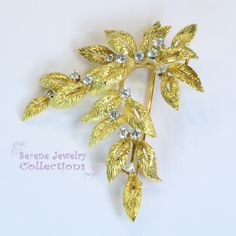 Thank you for coming in! Elegant 18k Yellow Gold Vintage Diamond Leaves Brooch adorned with sparkly white diamond rounds! Total Weight: 13.93 grams Size: 2.5 inches tall, 1.7 inch wide Precious Metal: 18k Solid gold Precious stones: -White Round Diamonds: 0.7 carats Hallmark: 18K Platinum Diamond Rings, Brooch Bouquets, Gold Leaves, Brooch Vintage, Platinum Ring, Precious Metal, Gold Flowers, Vintage Diamond, Antique Rings