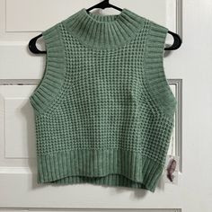 Nwt Green Sweater Vest Waffle Knit Jessica Simpson, Size Medium Super Cute, Just Never Reached For It!! Cozy Knit Sweater Vest For Spring, Casual Open Knit Crew Neck Sweater Vest, Crew Neck Open Knit Sweater Vest, Open Knit Tops For Winter Layering, Winter Open Knit Sweater Vest, Casual Cropped Sweater Vest For Winter, Sleeveless Textured Knit Winter Tops, Green Crew Neck Sweater Vest For Winter, Fall Layering Open Knit Sweater Vest