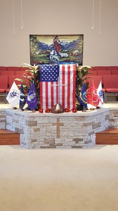 the american flag is on display with other decorations