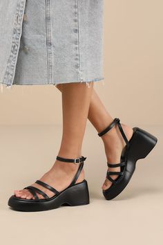 Whether you dress 'em up or dress 'em down, the Lulus Prescott Black Strappy Platform Ankle Strap Sandals are ready to hit the streets! Smooth faux leather shapes these must-have sandals with an almond-shaped footbed, crisscrossing toe straps, and a slender vamp strap (all atop a 1"" toe platform). Matching straps sprout from the sides to host a slender ankle strap with an adjustable silver buckle. A chunky block heel completes the look! Available in whole sizes only. 3" platform heel. Lightly c Ankle Strap Sandals Heels, Almond Shaped, Sandal Heels, Chunky Block Heels, Graduation Outfit, Dress Shoes Womens, Platform Heel, Ankle Strap Sandals, High Heel Sandals