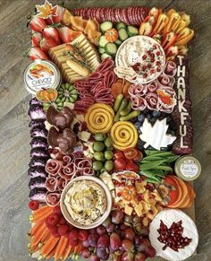 a platter filled with lots of different types of food