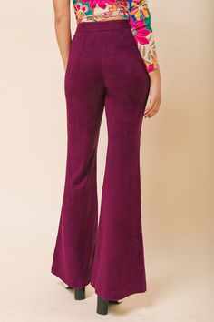 The BREEZY BEAUTY SUEDE PANTS are the perfect combination of style and comfort. Crafted with soft faux suede fabric, these pants have a smooth front closure, seam at center front, and a flattering flared silhouette. Enjoy the luxe look of suede with the convenience of a lightweight, breathable material. Details Self: 90% Polyester 10% Spandex Size & Fit - Model is 5`8" And Wearing Size Small - Measurements Taken From Size Small - Approx. Length: 43" Fitted Suede Bottoms For Fall, Chic High-waisted Leggings For Loungewear, Chic Full-length Loungewear Bottoms, Chic Full Length Pants For Loungewear, Chic Wide Leg Leggings With Elastic Waistband, Chic Wide-leg Leggings With Elastic Waistband, Suede Pants, Faux Suede Fabric, Suede Fabric