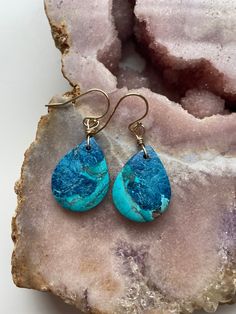 A gem lovers dream! Gorgeous rare one of a kind shattuckite earrings! Hang length is 40mm Ear wire is 14kt gold filled Artisan Long Drop Matching Earrings, Artisan Long Drop Matching Earrings Jewelry, Artisan Long Drop Earrings With Matching Jewelry, Artisan Long Drop Pierced Jewelry, Unique Teardrop Plug Earrings For Gift, Bohemian Gemstone Teardrop Earrings, Unique Gemstone Drop Earrings, Artisan Teardrop Gemstone Earrings, Handmade Turquoise Drop Jewelry