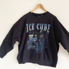 Ice Cube Black Crew Neck Sweatshirt Large. Retro Washed Cotton-Poly Sweatshirt With Ice Cube Graphic Printed At The Front. Pullover Style In A Slightly Relaxed Fit. See Pics For Details! Content + Care - Cotton, Polyester - Machine Wash - Imported Item Is New Without Tags But Blacklisted To Prevent In Store Returns. Please Msg Me W/ Any Questions & Oversized Black Grunge Tops, Oversized Crew Neck Graphic Tee, Oversized Graphic Tee For Winter, Oversized Graphic Print Tops For Winter, Vintage Black Tops With Letter Print, 90s Black Tops With Letter Print, Black Drop Shoulder Top With Letter Print, Grunge Long Sleeve Relaxed Fit Tops, Black Drop Shoulder Top With Graphic Print