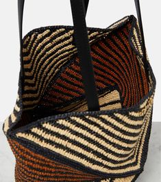 Height 31cm-12"
Min. width 26cm-10"
Max. width 41cm-16"
Depth 14cm-5.5"
Length of handles 57cm-22.5" Luxury Handwoven Double Handle Straw Bag, Luxury Handwoven Straw Bag With Double Handle, Luxury Brown Crochet Bag For Shopping, Modern Woven Leather Beach Bag, Modern Woven Leather Beach Shoulder Bag, Luxury Handwoven Basket-shape Shoulder Bag, Modern Woven Leather Shoulder Bag For Beach, Luxury Rectangular Straw Bag With Rolled Handles, Luxury Natural Bag For Market