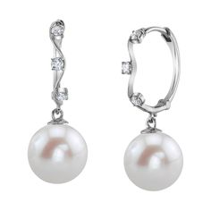 These exquisite pearl huggie earrings add a touch of elegance to any occasion. These earrings feature two lustrous 10mm AAAA quality Freshwater pearls, hand picked for their gorgeous luster and unblemished surface. The pearls are mountings on 14K white gold. Elegant White Gold Round Huggie Earrings, Classic White Huggie Pearl Earrings, Classic Pearl Charm Huggie Earrings For Anniversary, Classic Huggie Pearl Earrings For Anniversary, White Pearl Hoop Earrings For Formal Events, White Hoop Pearl Earrings For Formal Occasions, White Hoop Pearl Earrings For Formal Events, Elegant Clip-on Huggie Earrings As Gift, Elegant Clip-on Huggie Earrings For Gift