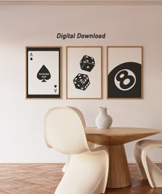 a table and chairs in a room with three pictures on the wall above it that says digital download