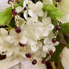 Beautifully faceted garnet coin beads necklace. Can be worn as is or with pendants. Length 16" Extender 2.75" Garnet properties is a stone of prosperity and abundance, encouraging gratitude and service to others. It is a deeply spiritual stone also known as the stone of good luck and health. It can help get rid of the negative energies and transform them to positive ones. It's a good gemstone for purification and detoxification. -This information is intended for spiritual support only- Beads 4mm