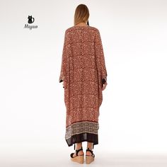 Introducing our stunning Brown Bat Wing Maxi Dress, a true statement piece for your wardrobe! This elegant long sleeve long dress is perfect for any occasion, whether you're dressing up for a special event or simply looking to add a touch of glamour to your everyday style. The unique bat wing design adds a fun and playful twist to this classic silhouette, making it a must-have piece for any fashion-forward individual. Elevate your look with this effortlessly chic and versatile dress that will tu Long Sleeve Printed Boho Dress For Fall, Fall Long Sleeve Printed Boho Dress, Fall Boho Long Sleeve Printed Dress, Flowy Long Maxi Dress For Fall, Flowy Long Sleeve Printed Maxi Dress, Long Sleeve Bohemian Dress For Fall, Bohemian Long Sleeve Dresses For Fall, Long Sleeve Brown Bohemian Boho Dress, Summer Long Sleeve Flowy Abaya