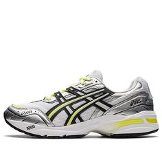 The Asics Gel 1090 is a modern take on a classic silhouette. Inspired by the lines of a motorcycle, this shoe emphasizes speed and agility. Its sleek design features a simplified upper and iconic details like the toe cap and tiger claw logo at the heel. The White Silver Yellow colorway adds a touch of sophistication to the sneaker. Perfect for running, jogging, or just everyday wear, the Asics Gel 1090 is a timeless classic. (SNKR/Retro/Casual/Unisex/Low Top) Asics Sneakers With Vibram Sole For Light Sports, Asics Sneakers For Light Sports With Vibram Sole, Functional Asics Running Shoes With Reflective Details, Asics Dynamic Sneakers With Reflective Details, Asics Sneakers With Air Cushioning, Asics Dynamic Sneakers With Air Cushioning, Asics Dynamic Sneakers With Vibram Sole, Asics Running Shoes With Vibram Sole For Sports, Dynamic Asics Sneakers With Vibram Sole