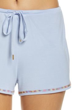 Short-sleeve pajamas in a blissfully soft knit you'll want to live in are detailed with colorful embroidery. 23" top length; 2 1/2" inseam; 14" leg opening; 9 1/2" front rise; 12 1/2" back rise Top has crewneck; short sleeves Shorts have drawstring waist 95% rayon, 5% spandex Machine wash, line dry Imported Blue Spring Sleepwear For Loungewear, Spring Blue Sleepwear For Loungewear, Blue Sleepwear For Spring Loungewear, Spring Cotton Pajama Shorts For Sleep, Comfortable Pajama Shorts For Spring Pajama Party, Comfortable Spring Pajama Shorts For Pajama Party, Spring Cotton Pajama Shorts For Relaxation, Cozy Sleepwear For Spring Lounging, Cozy Spring Sleepwear For Lounging