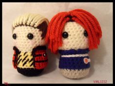 two crocheted dolls sitting next to each other