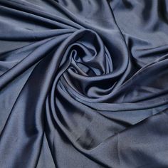 the fabric is very dark blue and it looks like something out of an old movie