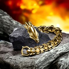 Why Us? 🌸   Free & Fast Shipping 📦 30-Day Moneyback Guarantee ✔️ Elegant & Aesthetic ⭐ Beautiful Japanese Atmosphere 🌠 Introducing our Dragon Bracelet 🐉 - a fusion of myth and modernity. The intricately detailed dragon charm, symbolizing strength and resilience, takes center stage on a durable yet elegant chain. With an adjustable design for a perfect fit, this bracelet effortlessly combines fantasy allure with versatile style. Elevate your look with this captivating accessory, making a bold statement wherever you go. 🔥✨ Elegant Adjustable Dragon Design Jewelry, Elegant Adjustable Jewelry With Dragon Design, Luxury Dragon Design Jewelry For Gift, Metal Wristband With Bracelet Strap As Gift, Luxury Metal Bracelet As Gift, Luxury Metal Bracelets As A Gift, Elegant Stainless Steel Wristband For Gift, Handmade Gold Stainless Steel Bracelets, Flexible Metal Jewelry As A Gift