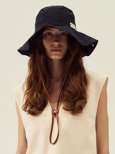 Marchen is a heritage mood fashion brand that not only stimulates the nostalgia of the older generation but also satisfies the new sensibilities of all generations by re-inventing the romantic design that the main characters in fairy tales would wear with a modern sensibility.- Trendy safari designed bucket hat- Classic and vintage mood leather strap detail- Breathable mesh lining gives lightweight and cool feel- You can create your own shape with built-in wire Vintage Adjustable Bucket Hat With Flat Brim, Vintage Adjustable Wide Brim Bucket Hat, Vintage Wide Brim Adjustable Bucket Hat, Vintage Bucket Hat For Outdoor Spring Use, Vintage Bucket Hat For Spring Outdoor, Vintage Adjustable Brimmed Bucket Hat, Vintage Spring Bucket Hat For Outdoor, Adjustable Vintage Brimmed Bucket Hat, Safari Bucket Hat