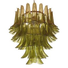 a green glass chandelier hanging from the ceiling