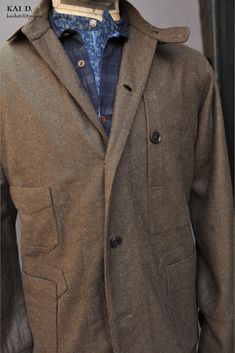 One of our signature jackets. Many interior pockets to hold all your belonging. This one is made in a wool felt in a dark olive color. The interior lining in a light weight virgin wool with a classic stripe pattern. Under collar trimmed with vintage brown wool. One inside pocket Can be buttoned all the way up at neck. Great fit, allow you to layer with sweater. Size M:Chest: 44"Shoulder width: 18"Front length from top shoulder: 29 1/2"Size L:Chest: 46"Shoulder width: 19"Front length from top sho Work Jacket, Linen Jacket, Work Jackets, All The Way Up, Olive Color, Wool Plaid, Cotton Lights, Vintage Brown, Stripes Pattern